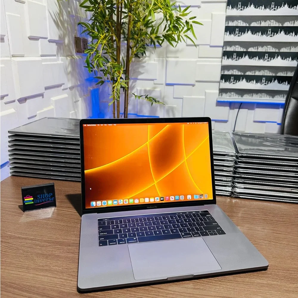 Apple MacBook with Silver Body and Black Keyboard